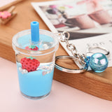 Sidiou Group Wholesale Creative Fruit Strawberry Keyring Acrylic Moving Liquid Car Bag Keychain Decompression Drift Bottle Key Chain Jewelry Gift