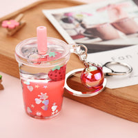 Sidiou Group Wholesale Creative Fruit Strawberry Keyring Acrylic Moving Liquid Car Bag Keychain Decompression Drift Bottle Key Chain Jewelry Gift