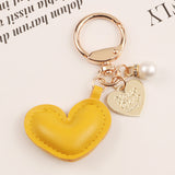 Sidiou Group New Creative Women Leather Heart Alloy Keychain PU Leather Pendant Key Chain With Pearl Charm Bag Accessories Keyring Party Gift
