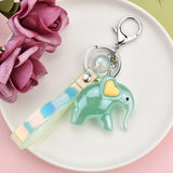 Sidiou Group Wholesale Acrylic Cute Cartoon Elephant Doll Magic Color Leather Rope Keychain Ladies Bag Pendant